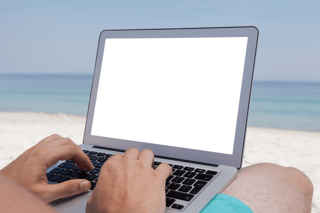 Man Working on Laptop Beachside with Transparent Screen Mockup