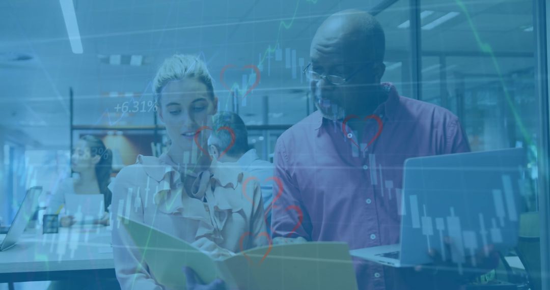 Diverse Colleagues Analyzing Financial Data in Office Setting