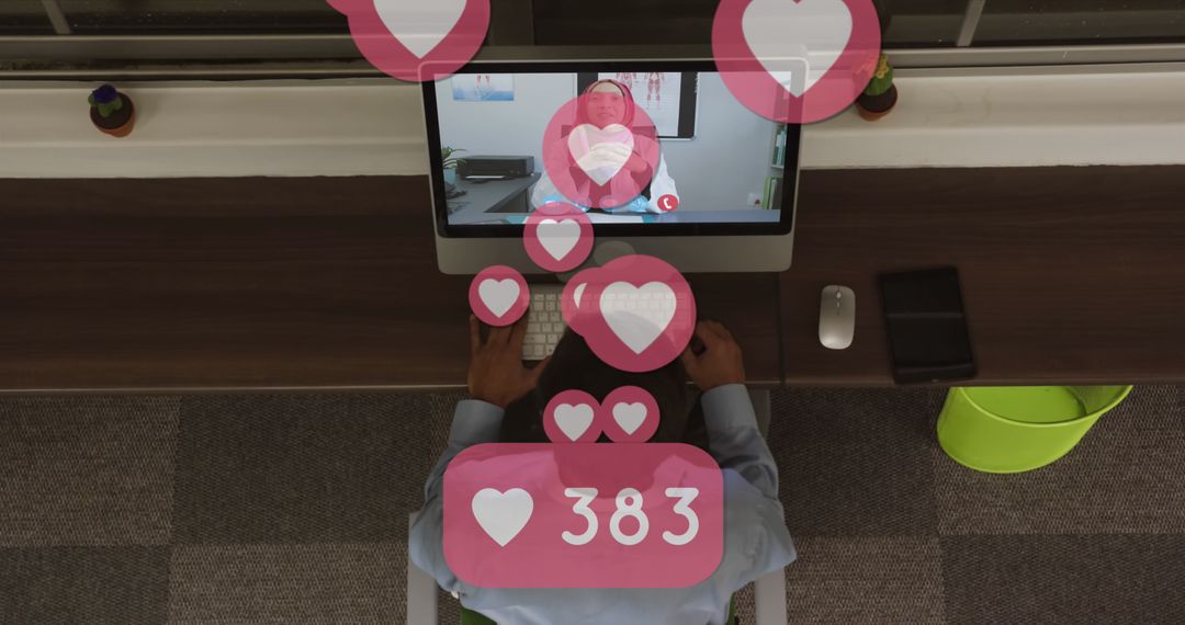 Social Media Engagement with Heart Icons in Modern Workspace