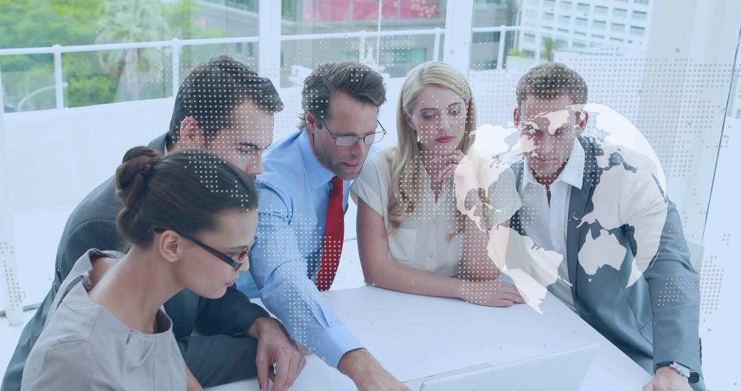 Diverse Business Team Discussing Global Strategy in Modern Office