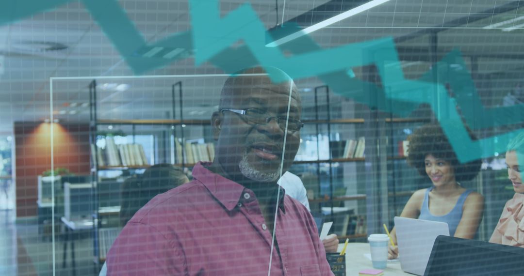 Diverse Business Team Analyzing Financial Data Together in Modern Office