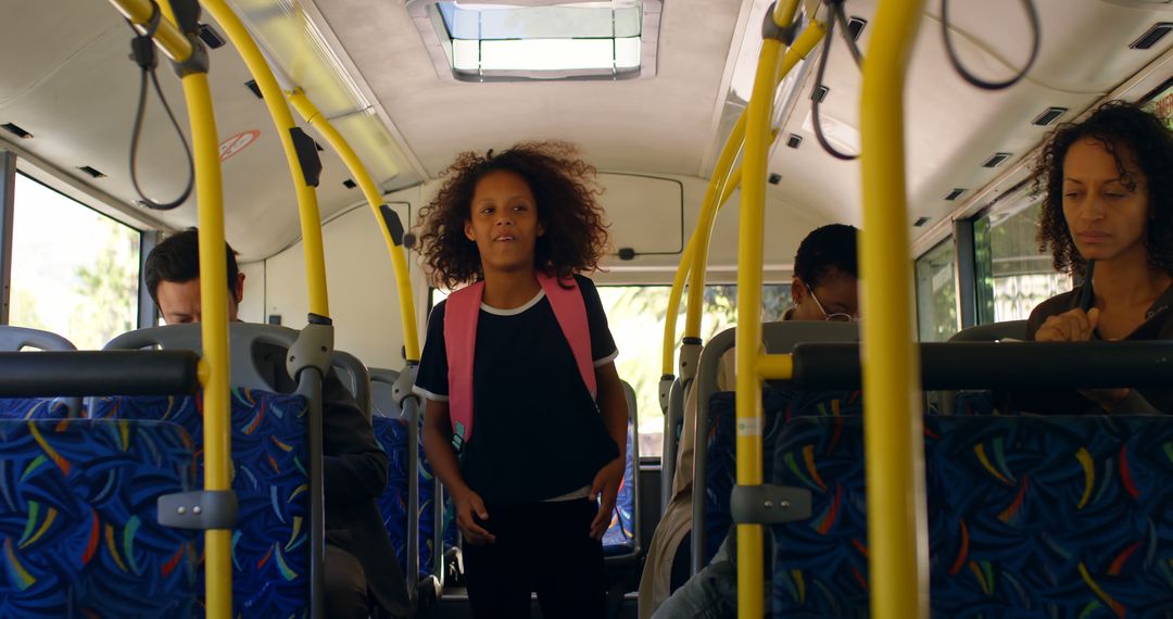 Diverse Commuters on City Bus During Daytime