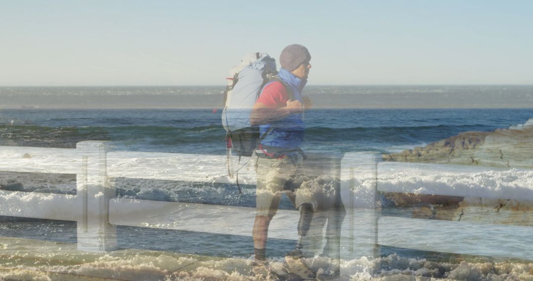Hiker Observing Ocean Waves on Coastal Walkway