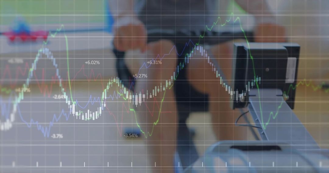 Man Rowing in Gym with Overlay of Financial Graphs Depicting Progress