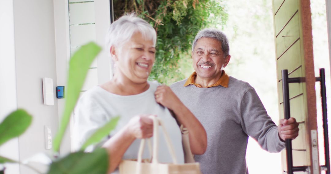 Happy Senior Couple Enjoying Shopping and Returning Home