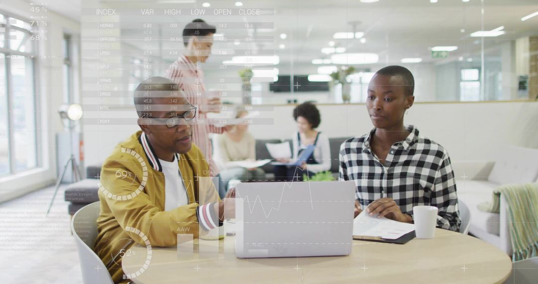 Modern Office Team Collaborating on Analytics Project