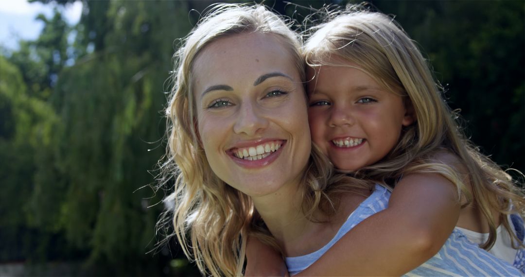 Happy mother with daughter on sunny day outdoors - Free Images, Stock Photos and Pictures on Pikwizard.com