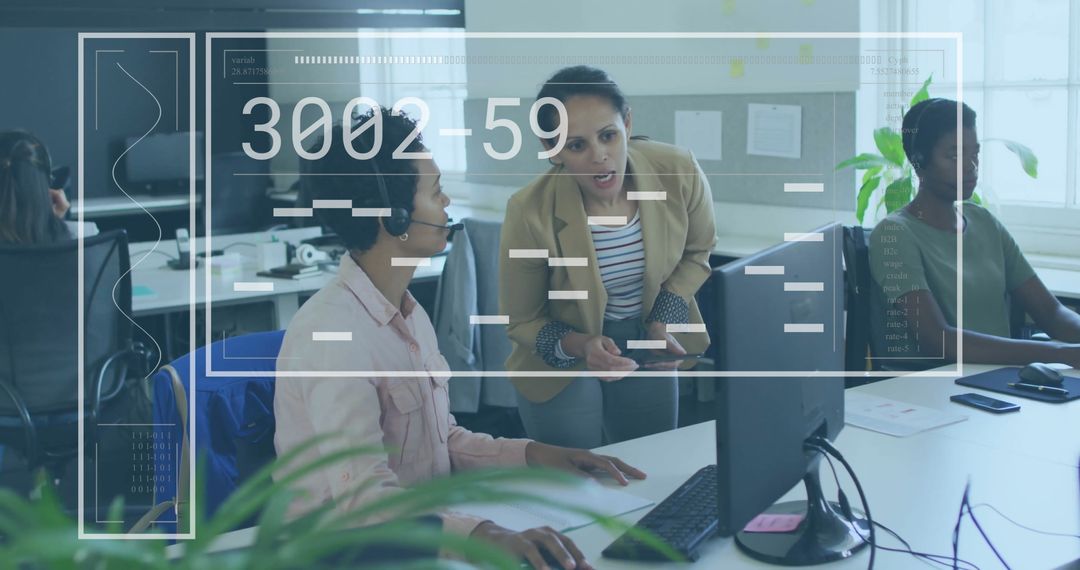 Collaborative Team Discussing Data Processing in Office