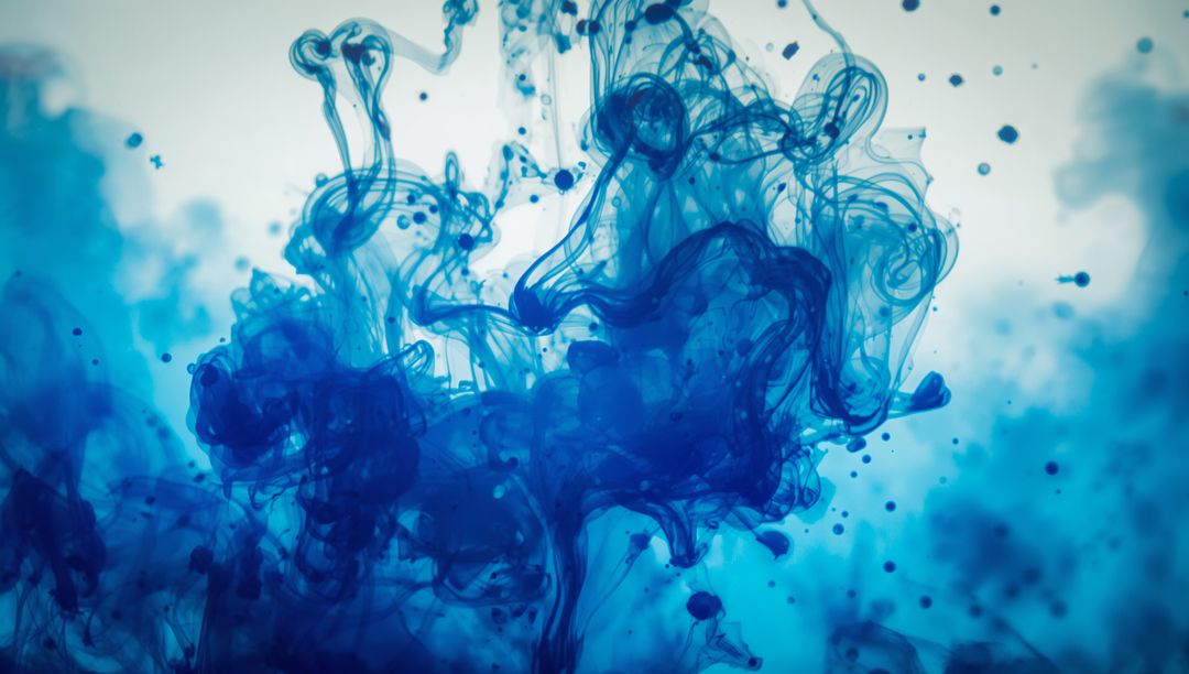 Swirling Blue Ink Creating Artistic Fluid Motion