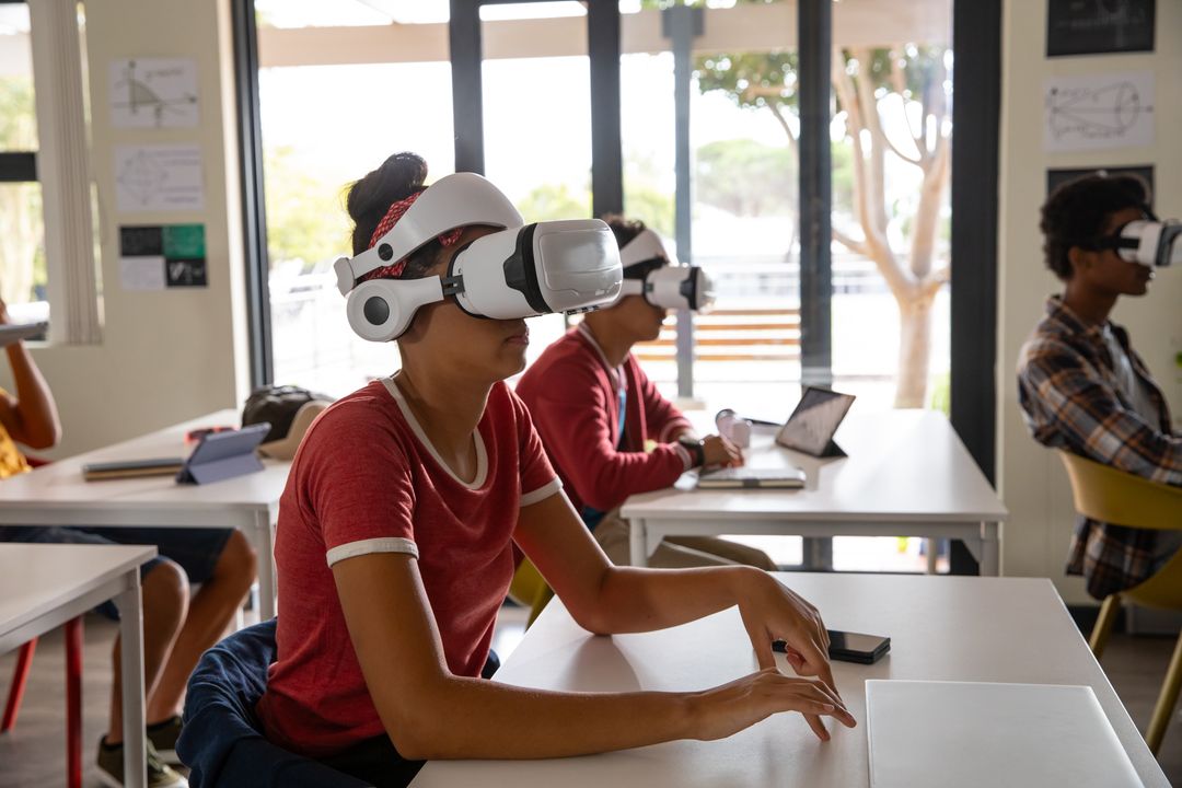 Diverse Students Using Virtual Reality Headsets in Classroom for Immersive STEM Training