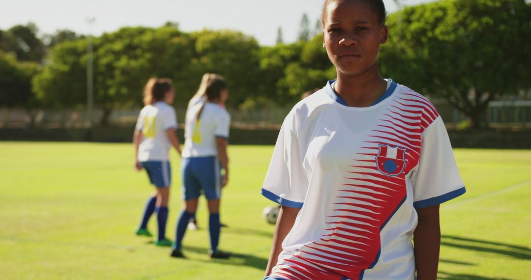 Confident Female Soccer Player on Field - Free Images, Stock Photos and Pictures on Pikwizard.com