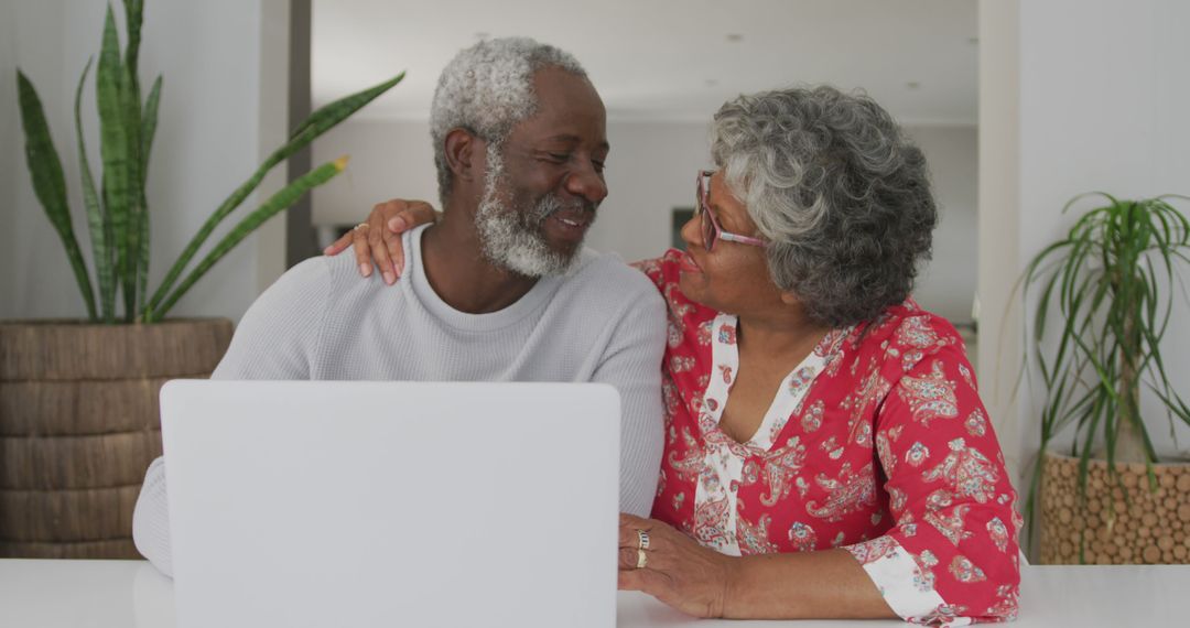 Senior Biracial Couple Bonding with Technology at Home