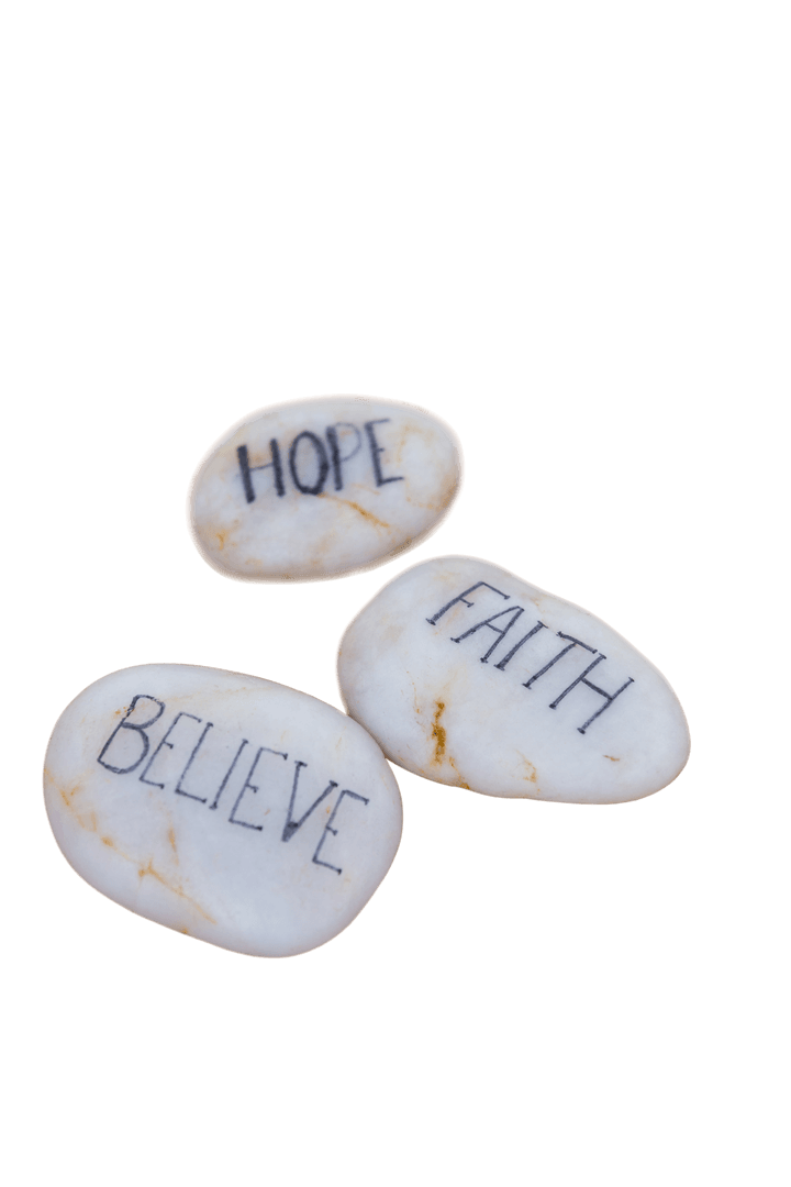 Transparent Pebbles with Inspirational Words on Bamboo Mat