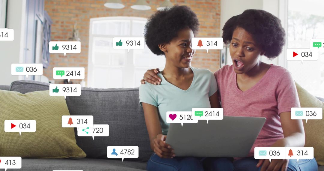 Excited Social Media Moments at Home on Couch with Laptop