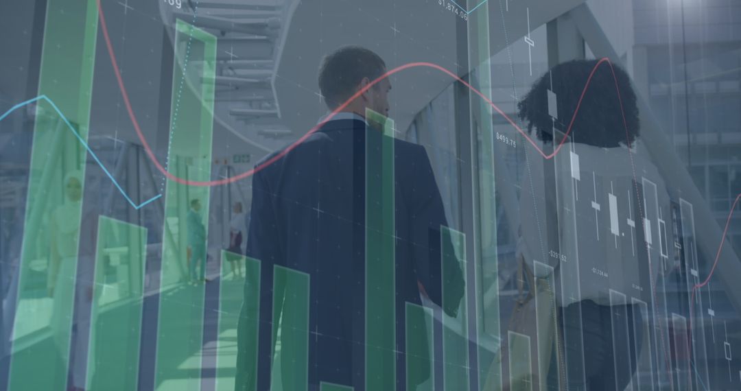 Business Professionals Analyzing Data Graphics in Office