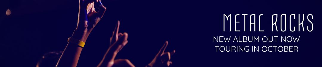 Electric energy at metal concert with raised hands amidst dark background