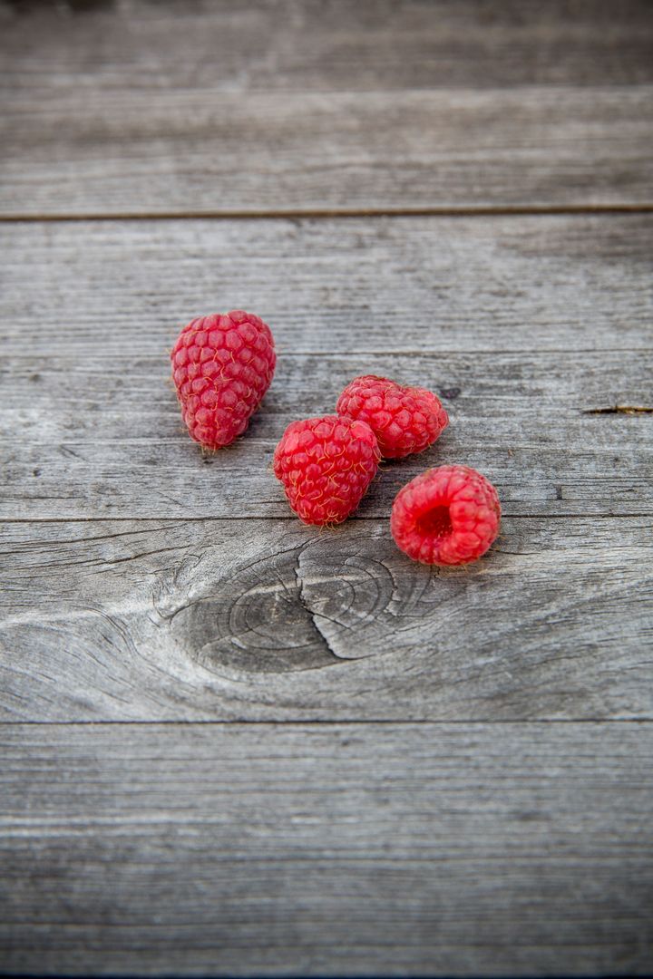 Fresh Red Raspberries on Rustic Wooden Table - Free Images, Stock Photos and Pictures on Pikwizard.com
