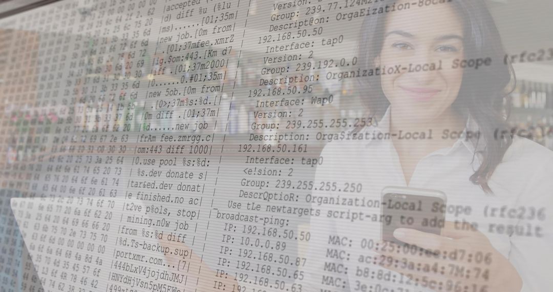 IT Professional using Smartphone and Laptop with Code Overlay