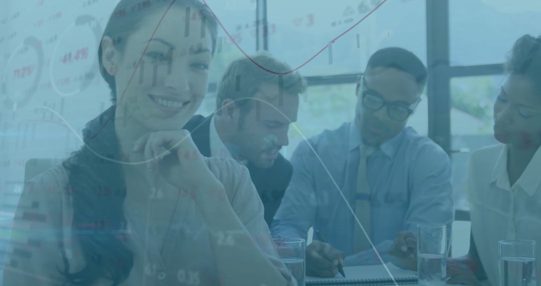 Diverse Professionals Analyzing Financial Charts in Office Setting