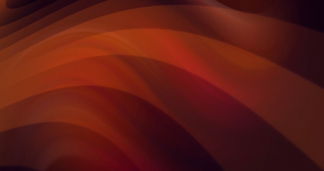 Dynamic Flow of Orange Waves Over Dark Background