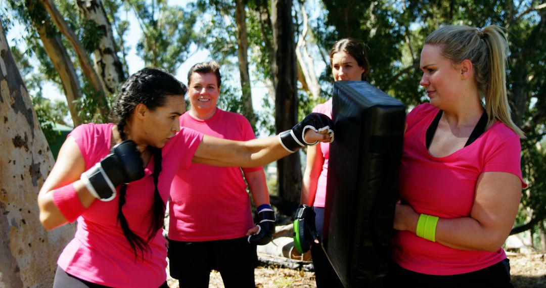 Women Training in a Boxing Class Outdoors, Strength and Fitness - Free Images, Stock Photos and Pictures on Pikwizard.com