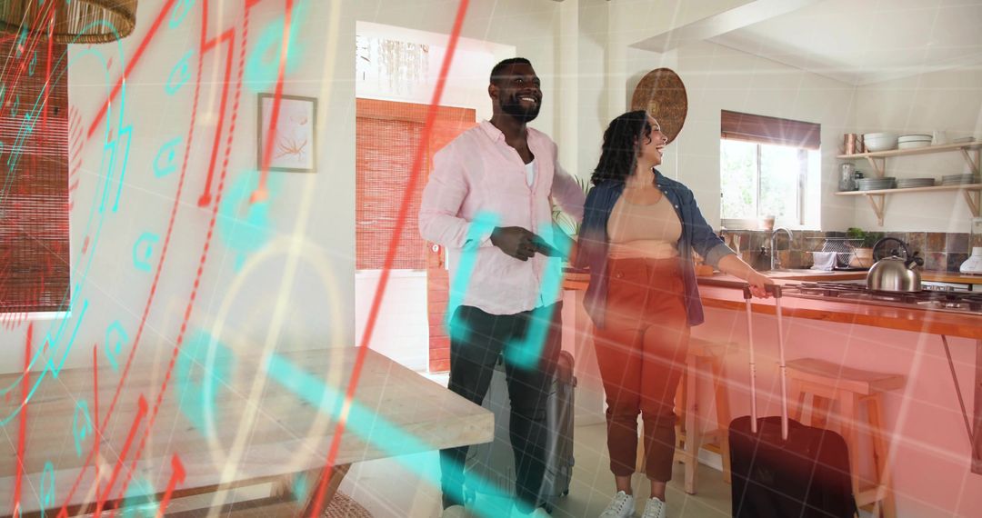 Smiling travelers arriving with suitcases into bright modern open-plan kitchen interior