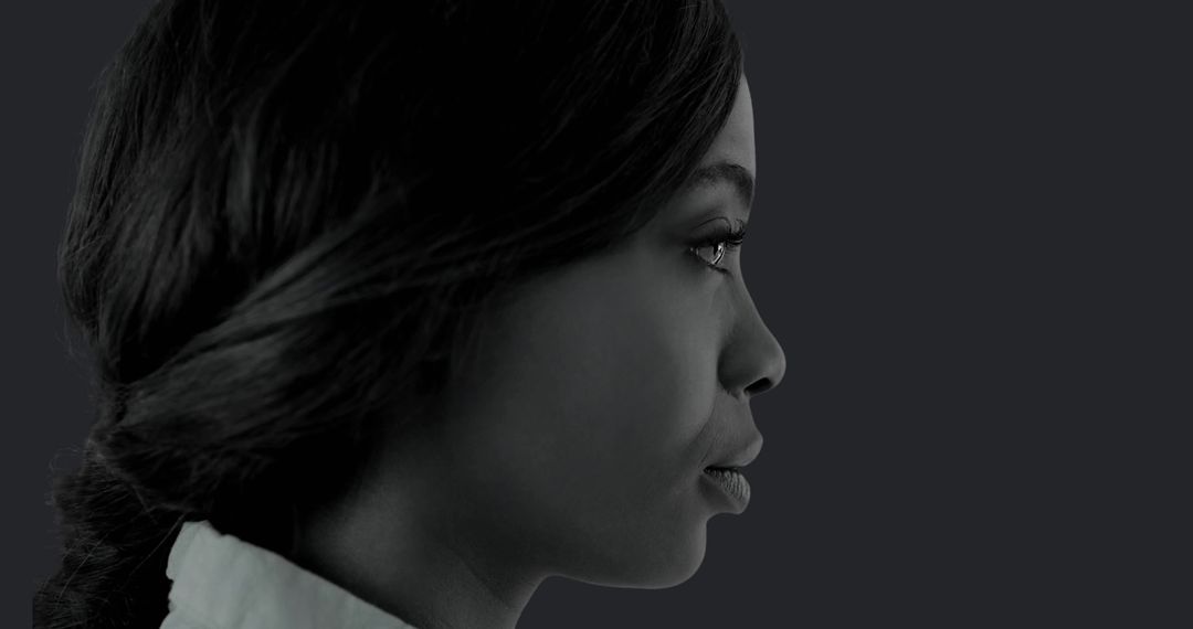 Elegant Side Profile of African American Woman in Studio