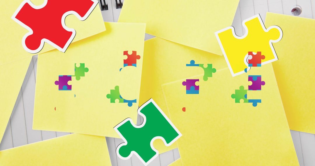 Colorful Jigsaw Pieces on Yellow Sticky Notes Creative Composition