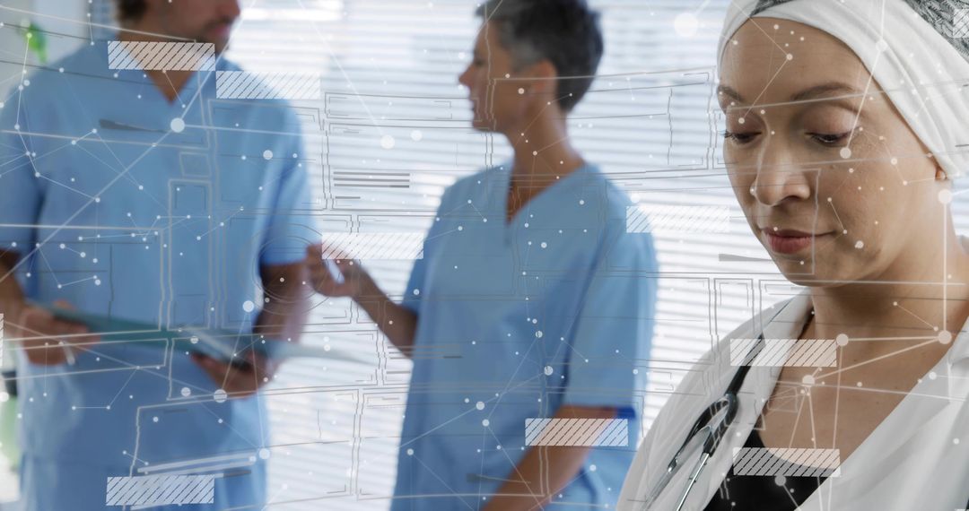 Headscarfed doctor reviewing digital health data with clinical team collaborating on tablet