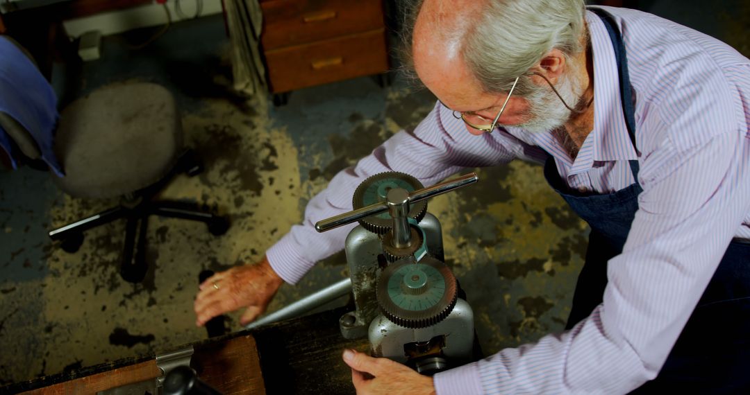 Elderly Man Working on Metal Lathe in Workshop - Free Images, Stock Photos and Pictures on Pikwizard.com