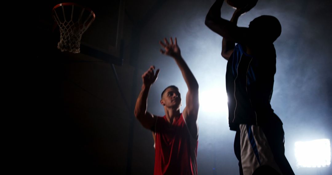 Silhouette Players Competing Intense Basketball Game