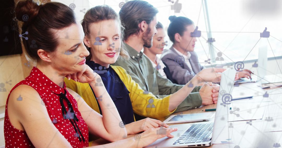 Diverse Team Collaborating with Digital Networking in Office