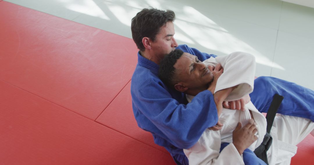 Two Men Practicing Judo in Martial Arts Gym - Free Images, Stock Photos and Pictures on Pikwizard.com