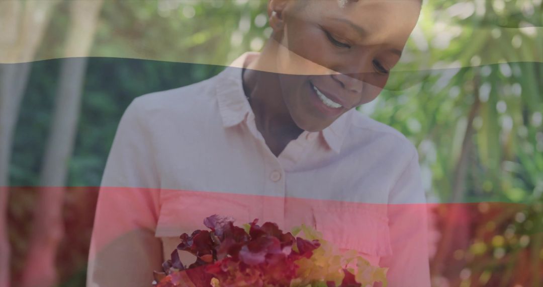 Smiling Gardener Holding Colorful Lettuce Planter Outdoors