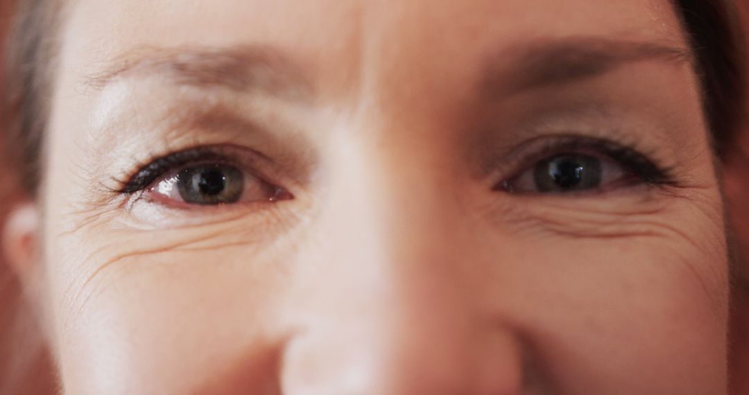 Close-Up of Mature Woman's Eyes and Wrinkles Highlighting Authentic Aging - Free Images, Stock Photos and Pictures on Pikwizard.com