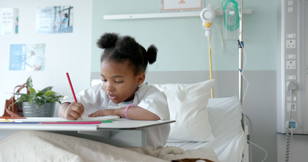 Young African American Girl Coloring in Hospital Bed - Free Images, Stock Photos and Pictures on Pikwizard.com