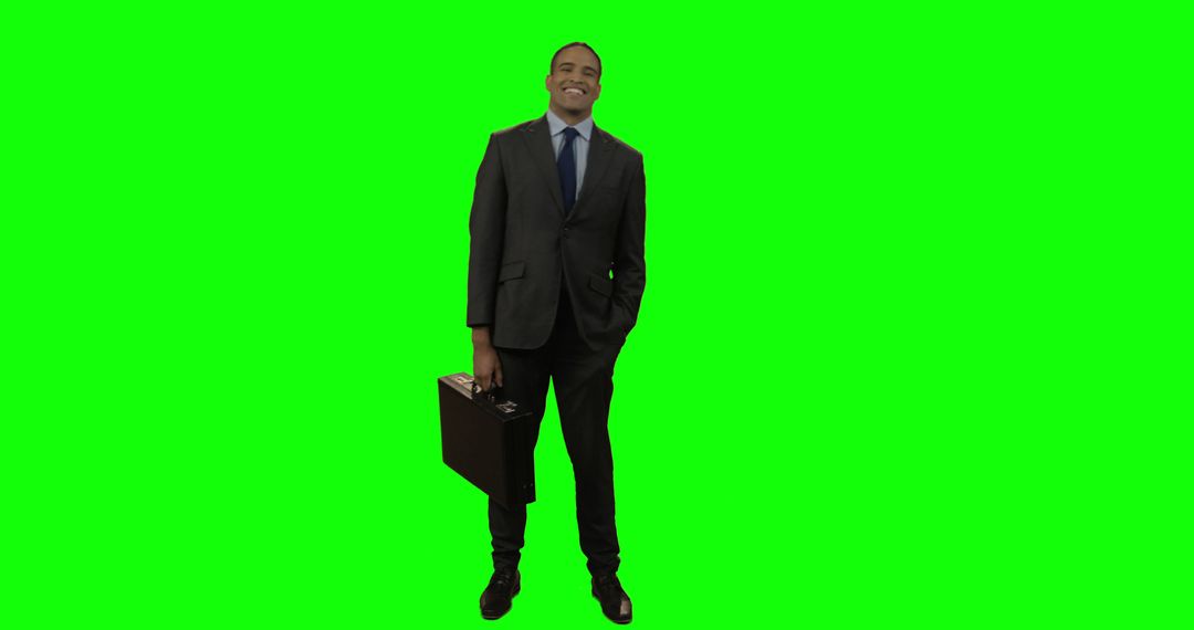 Smiling Businessman Holding Briefcase on Green Screen Background - Free Images, Stock Photos and Pictures on Pikwizard.com