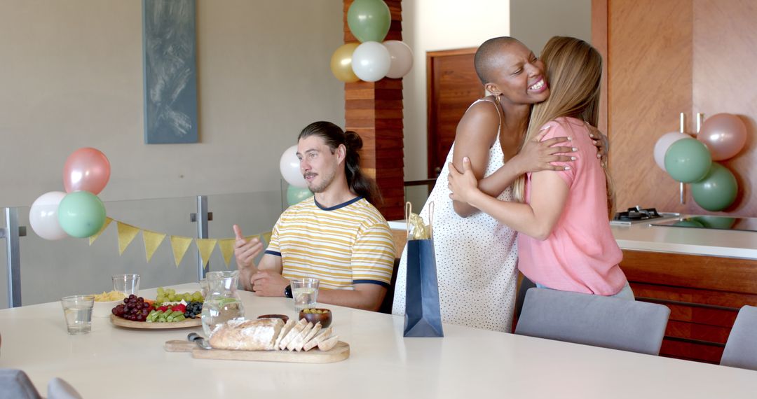 Joyful Home Gathering with Friends Hugging and Chatting