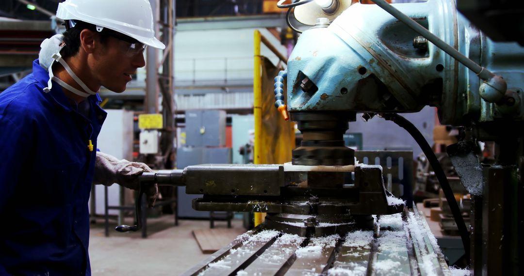 Industrial Worker Operating Metal Drilling Machine in Factory - Free Images, Stock Photos and Pictures on Pikwizard.com