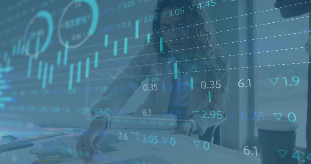 Women Analyzing Financial Reports in Modern Office with Digital Interface Overlay