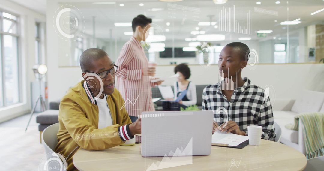 Diverse Team Engaging with Data Analytics in Modern Office