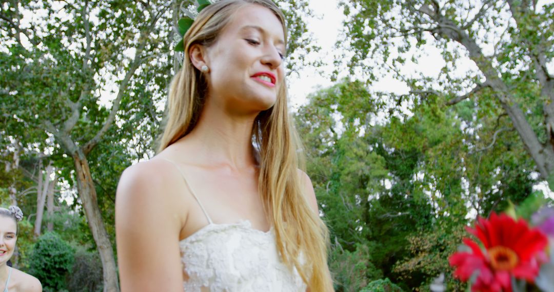 Joyful Bride Smiling Outdoors During Wedding Ceremony - Free Images, Stock Photos and Pictures on Pikwizard.com