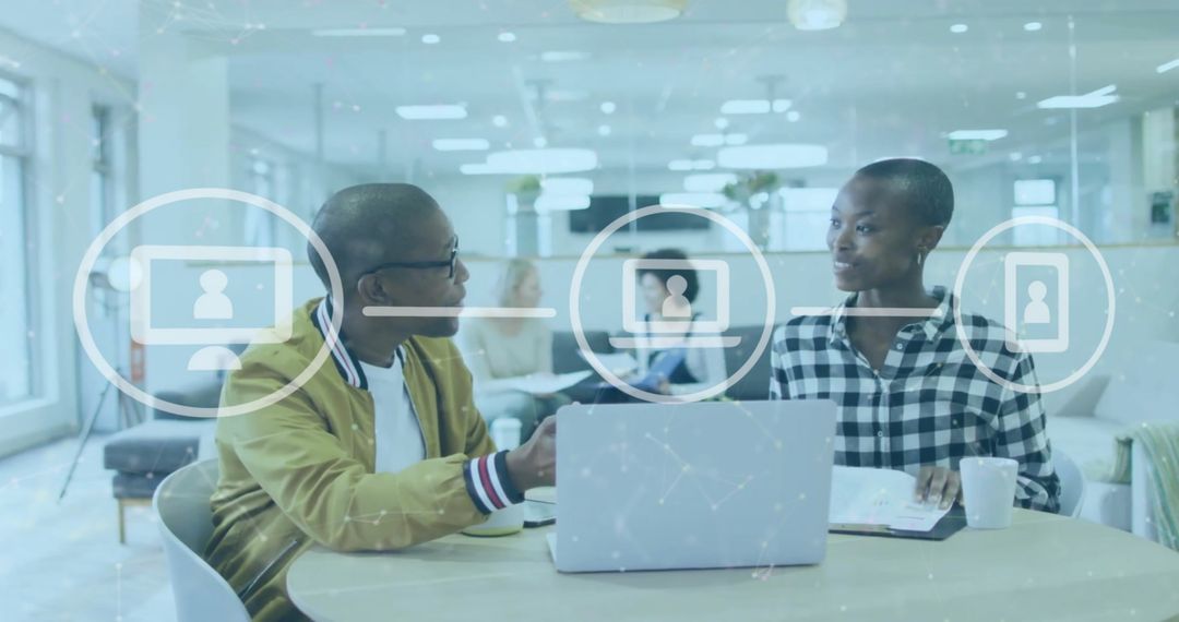 Diverse Colleagues Discussing Reports with Icon Overlays