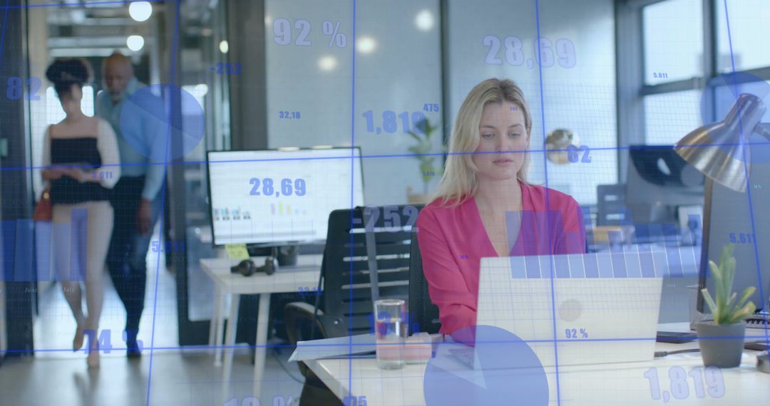 Business Team Analyzing Stock Market Data in Modern Office Setting