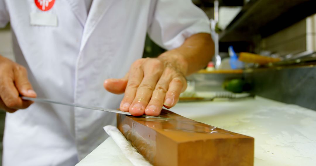 Chef in Professional Kitchen Sharpening Knife for Precision - Free Images, Stock Photos and Pictures on Pikwizard.com