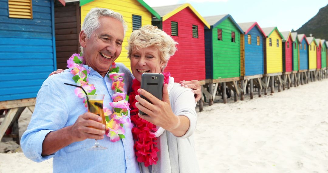 Senior Couple Enjoying Beach Vacation Taking Selfie - Free Images, Stock Photos and Pictures on Pikwizard.com