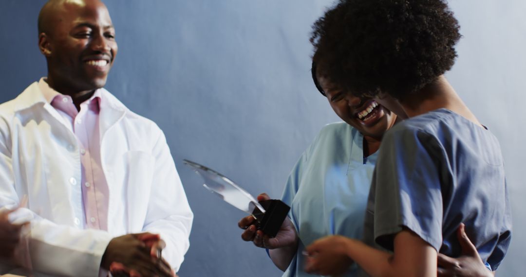 Professionals Celebrating Success with Handshake and Smiles