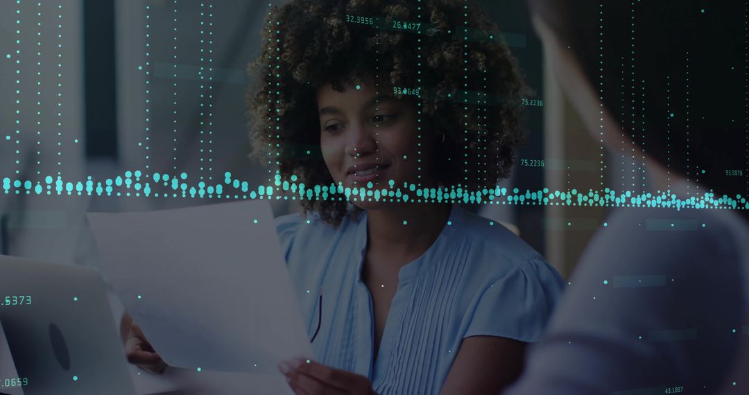 Woman Analyzing Data with Digital Overlay in Office Environment