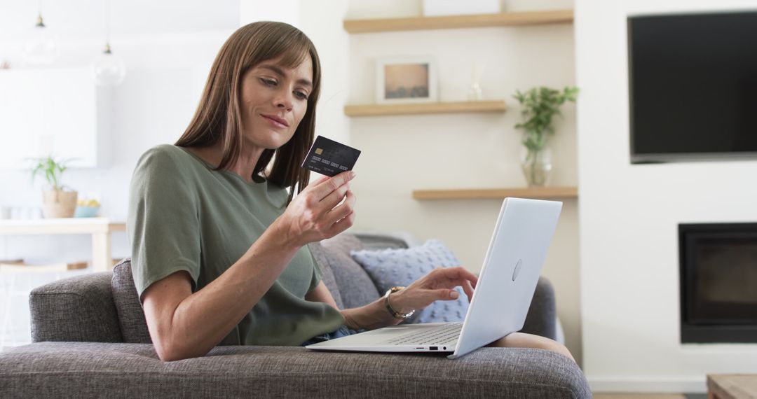 Middle-Aged Woman Shopping Online in Comfortable Living Room