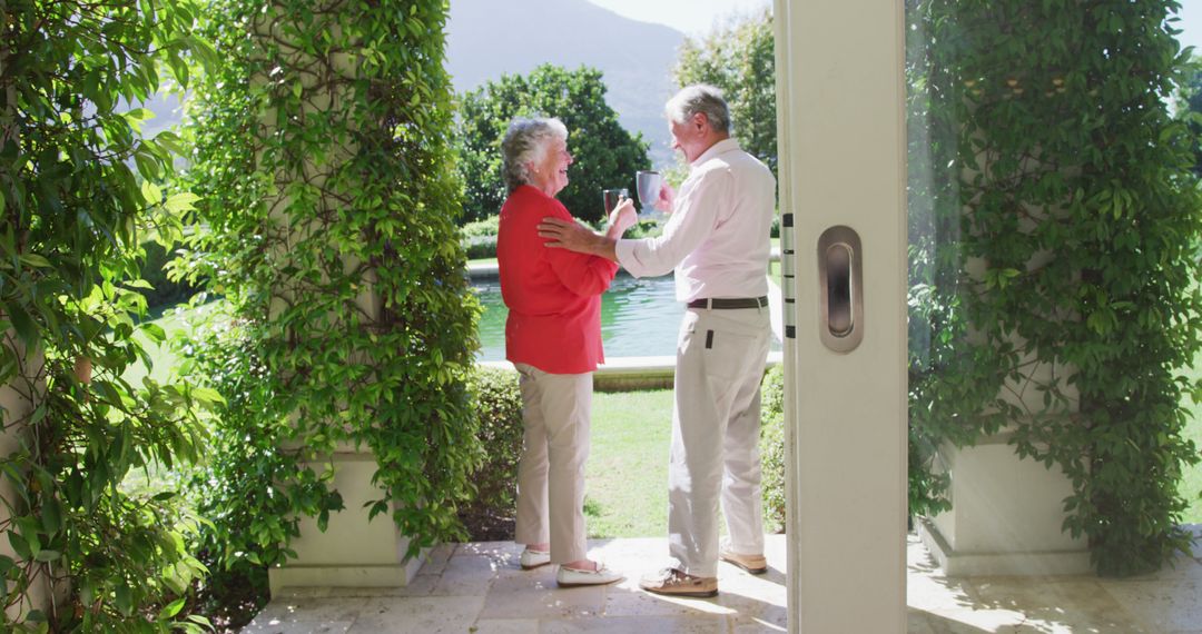 Elderly Couple Enjoying Time Together in Lush Garden - Free Images, Stock Photos and Pictures on Pikwizard.com